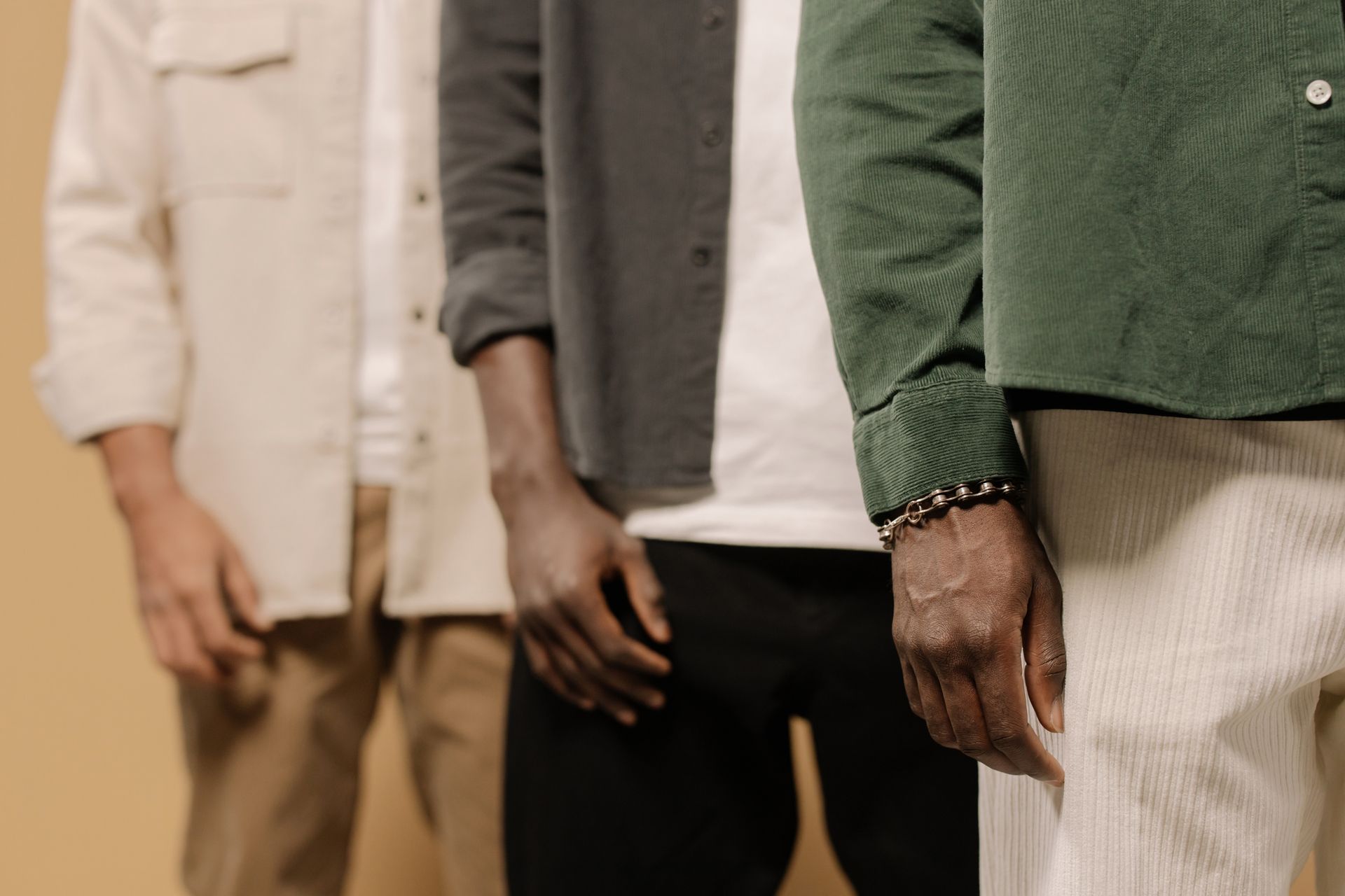 Men posing in studio wearing tailored big and tall menswear